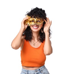 Smiling young woman in carnival mask isolated on white