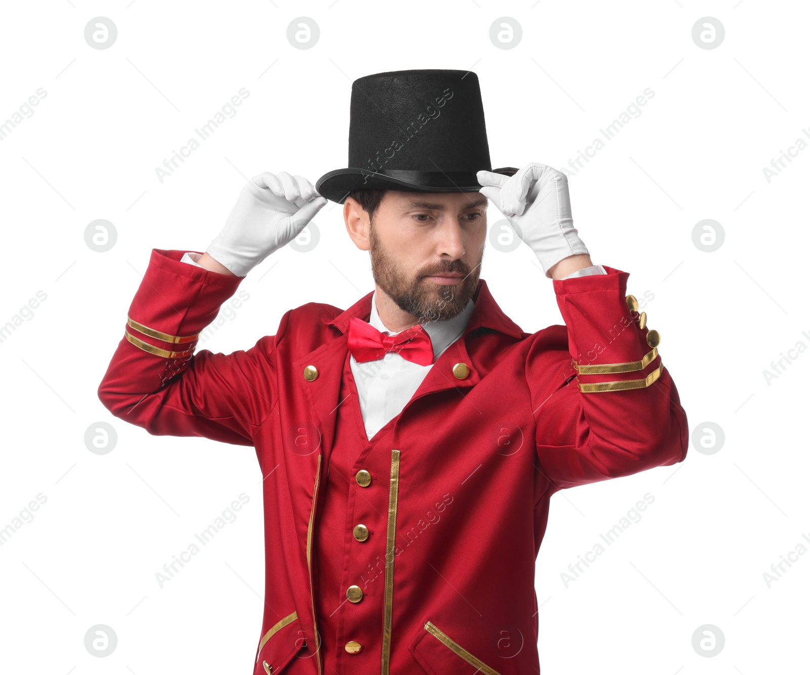 Photo of Portrait of showman in red costume and hat on white background