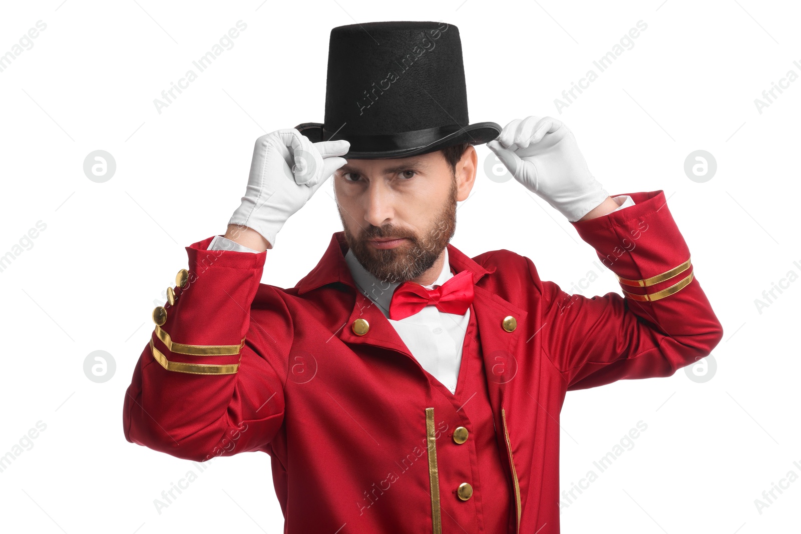 Photo of Portrait of showman in red costume and hat on white background