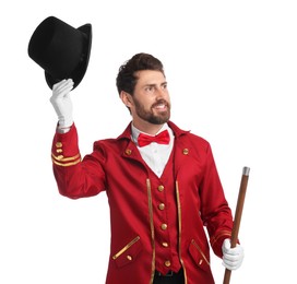 Photo of Portrait of showman in red costume and hat on white background