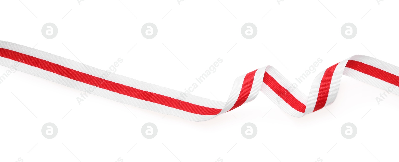 Photo of Colorful striped ribbon isolated on white, top view