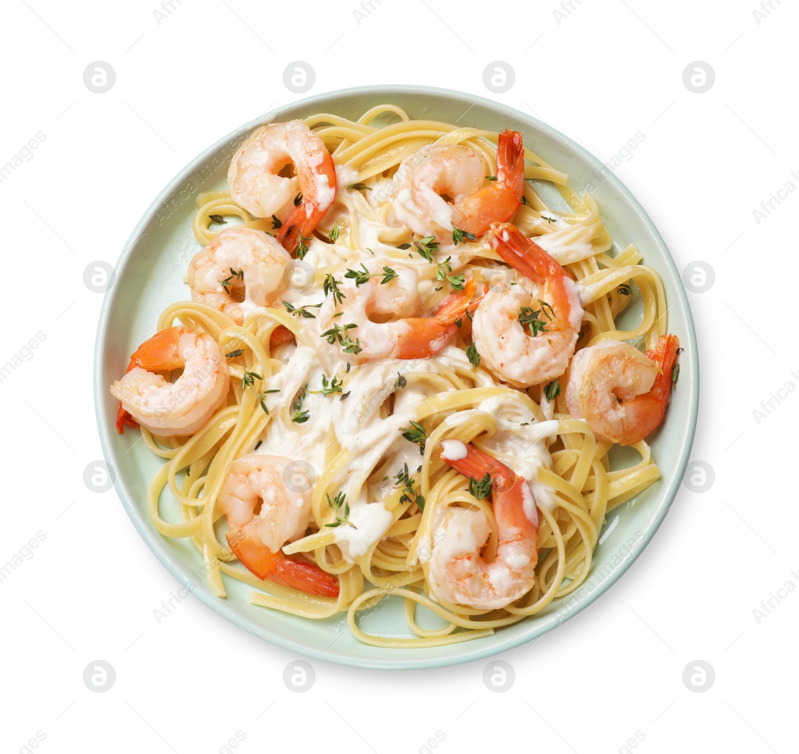 Photo of Delicious pasta with shrimps and creamy sauce isolated on white, top view