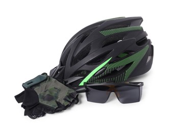 Bicycle helmet, goggles and fingerless gloves isolated on white