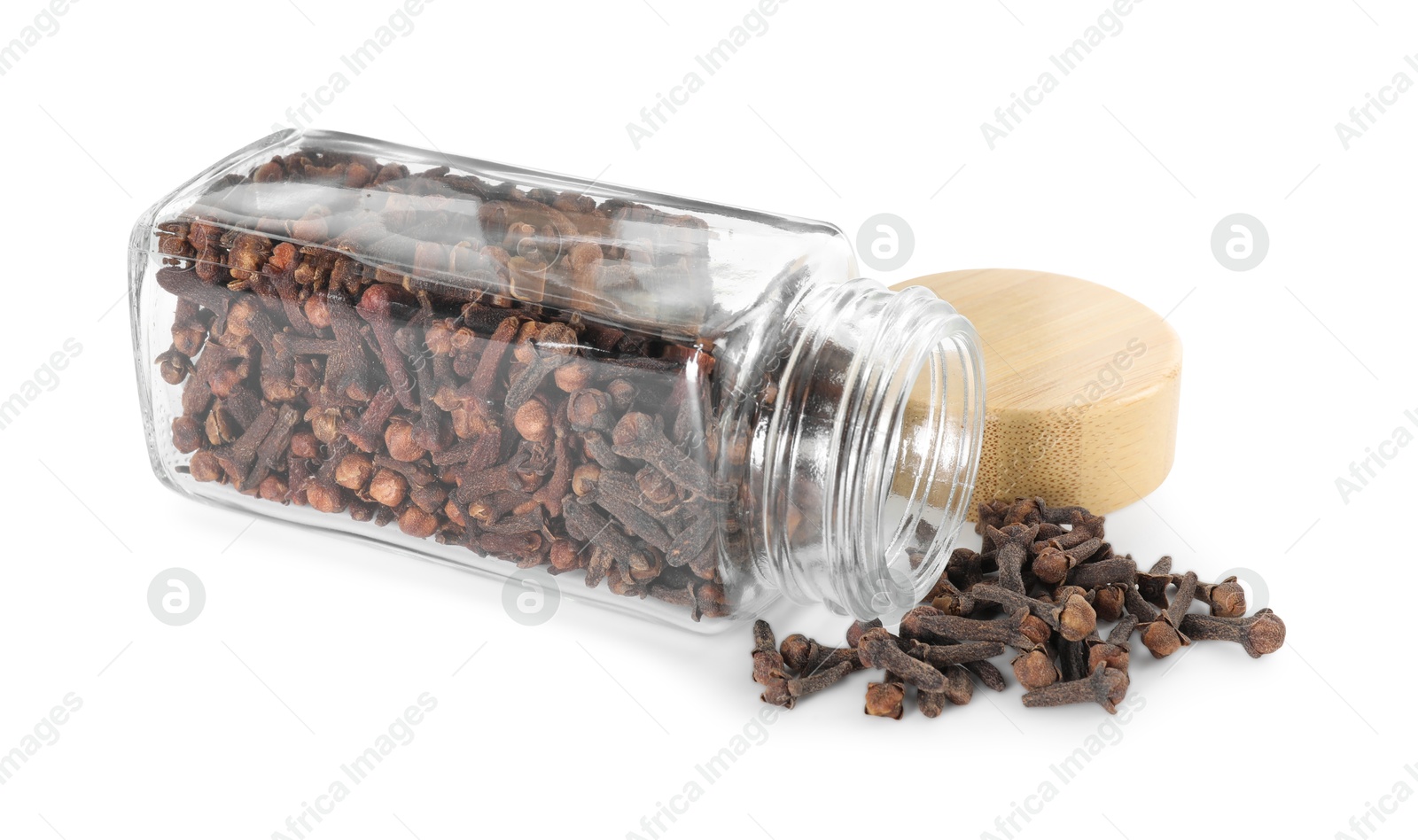 Photo of Clove buds and glass jar isolated on white