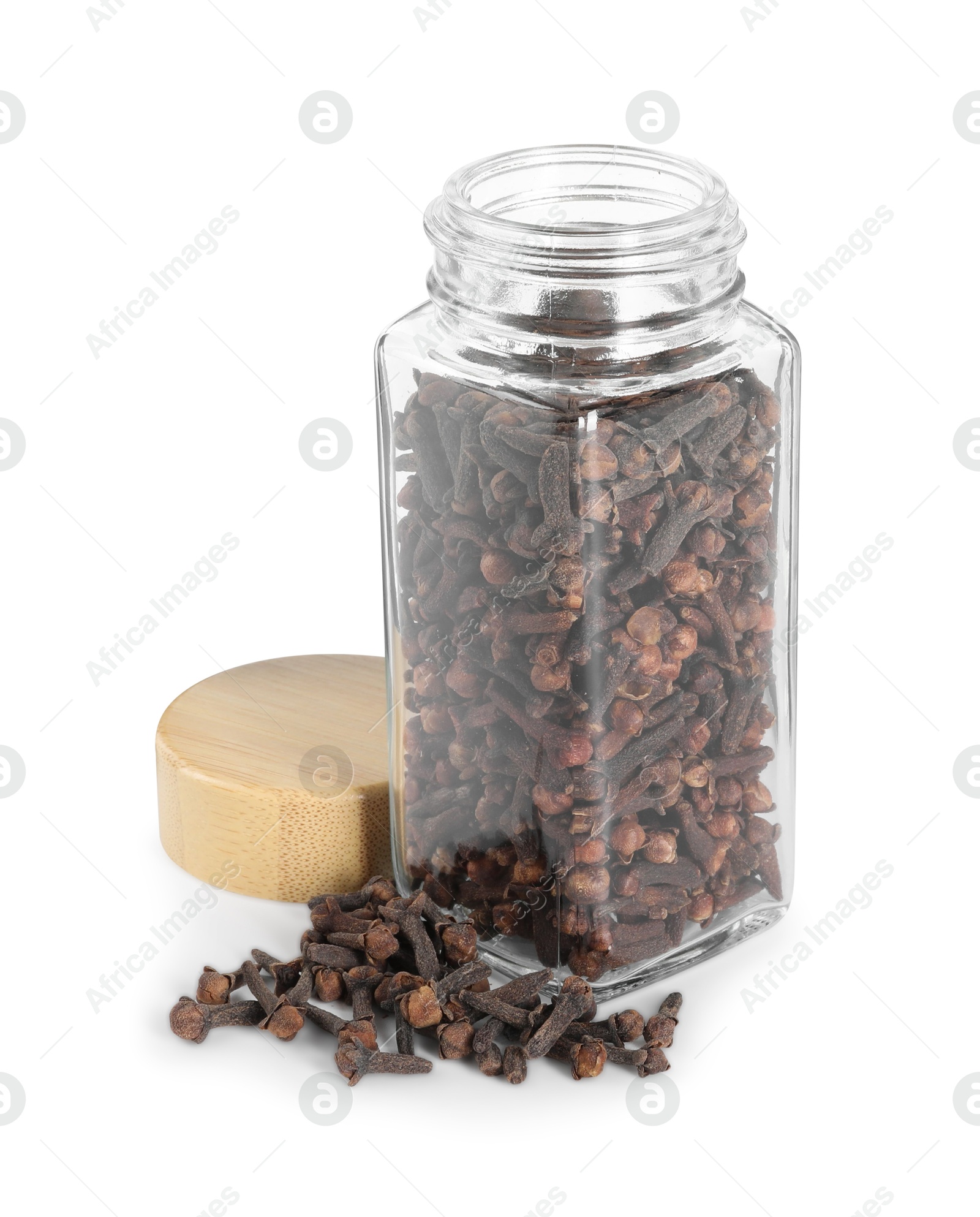 Photo of Clove buds in glass jar isolated on white