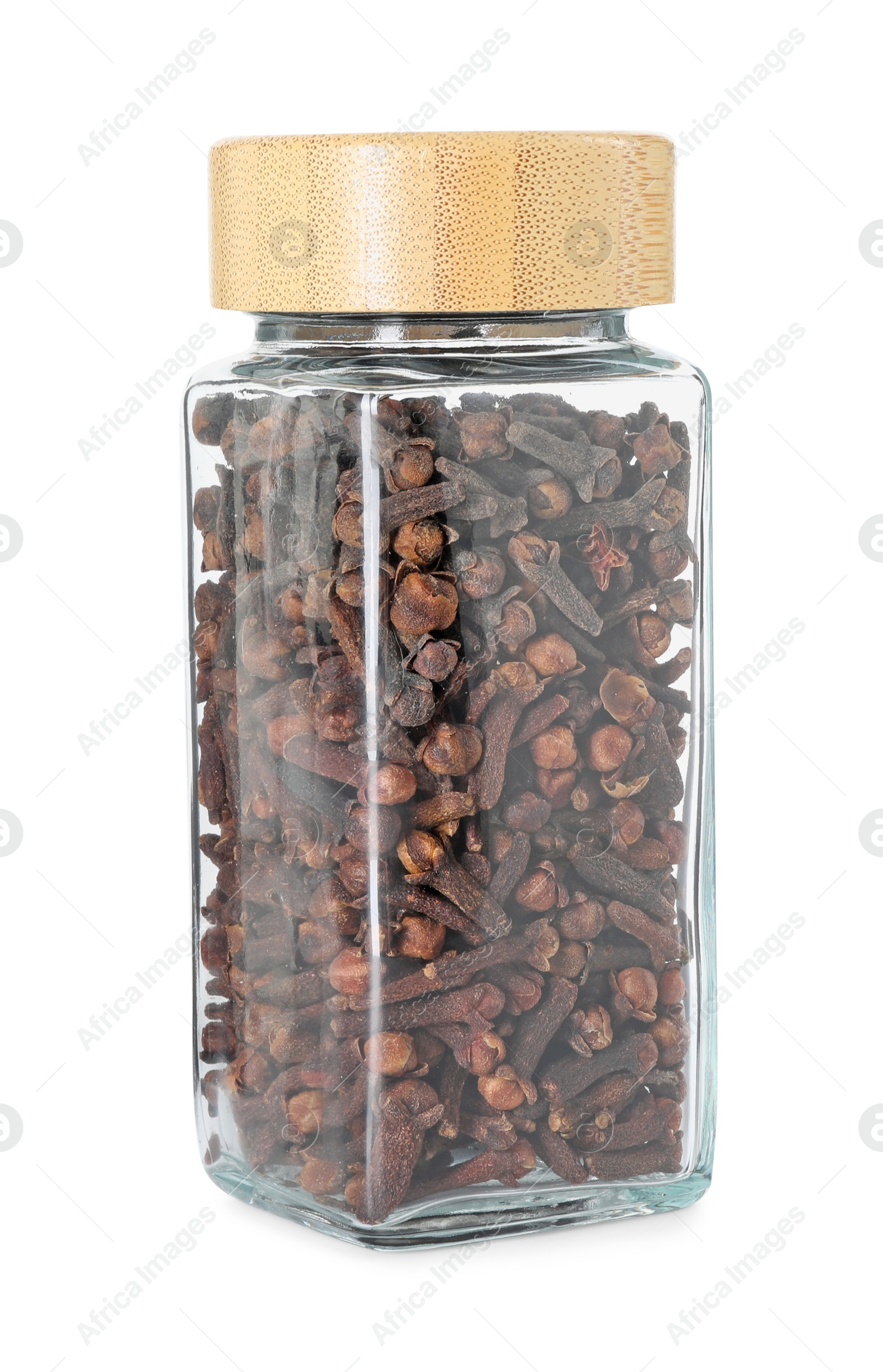 Photo of Clove buds in glass jar isolated on white