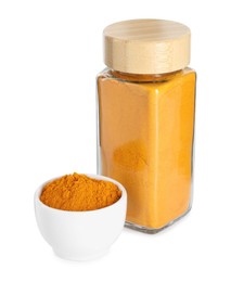 Curry powder in glass jar and bowl isolated on white