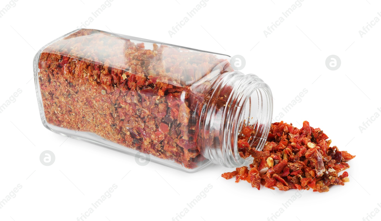 Photo of Red chili pepper flakes and glass jar isolated on white