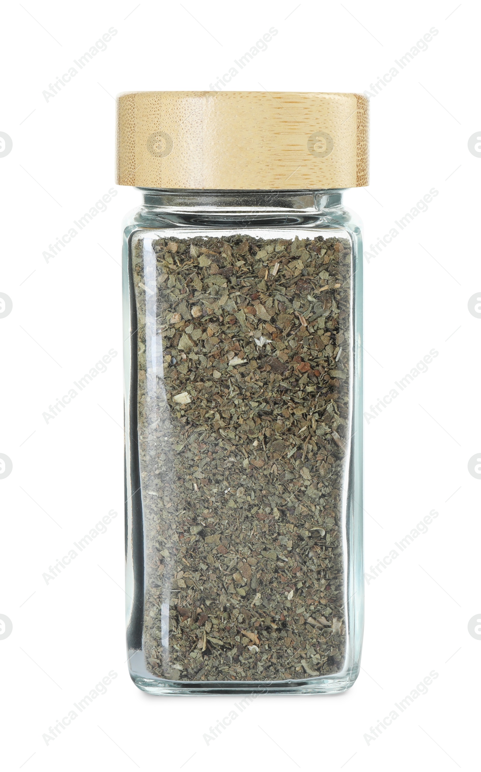 Photo of Dry basil in glass jar isolated on white