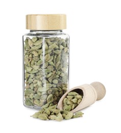 Photo of Cardamom seeds in glass jar and scoop isolated on white