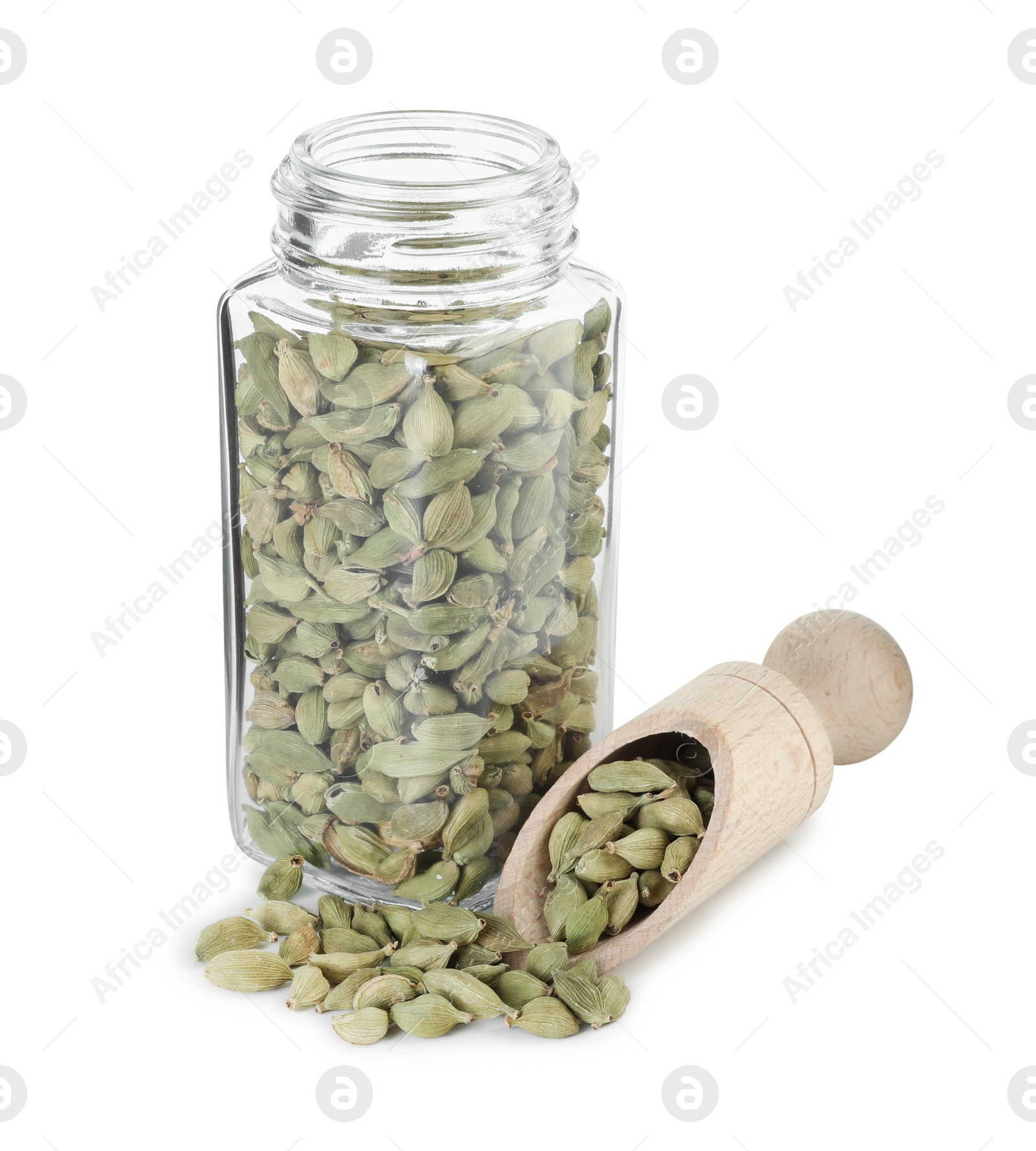 Photo of Cardamom seeds in glass jar and scoop isolated on white