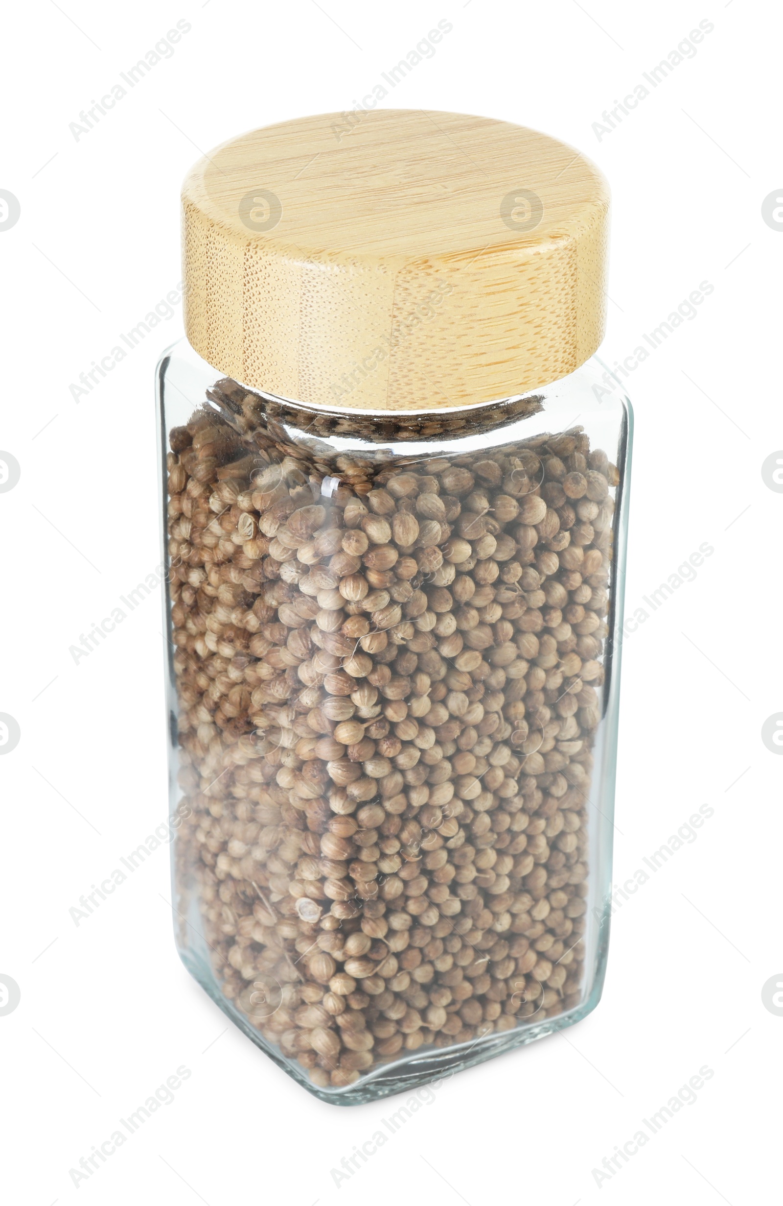 Photo of Coriander in glass jar isolated on white