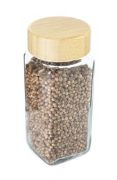 Photo of Coriander in glass jar isolated on white