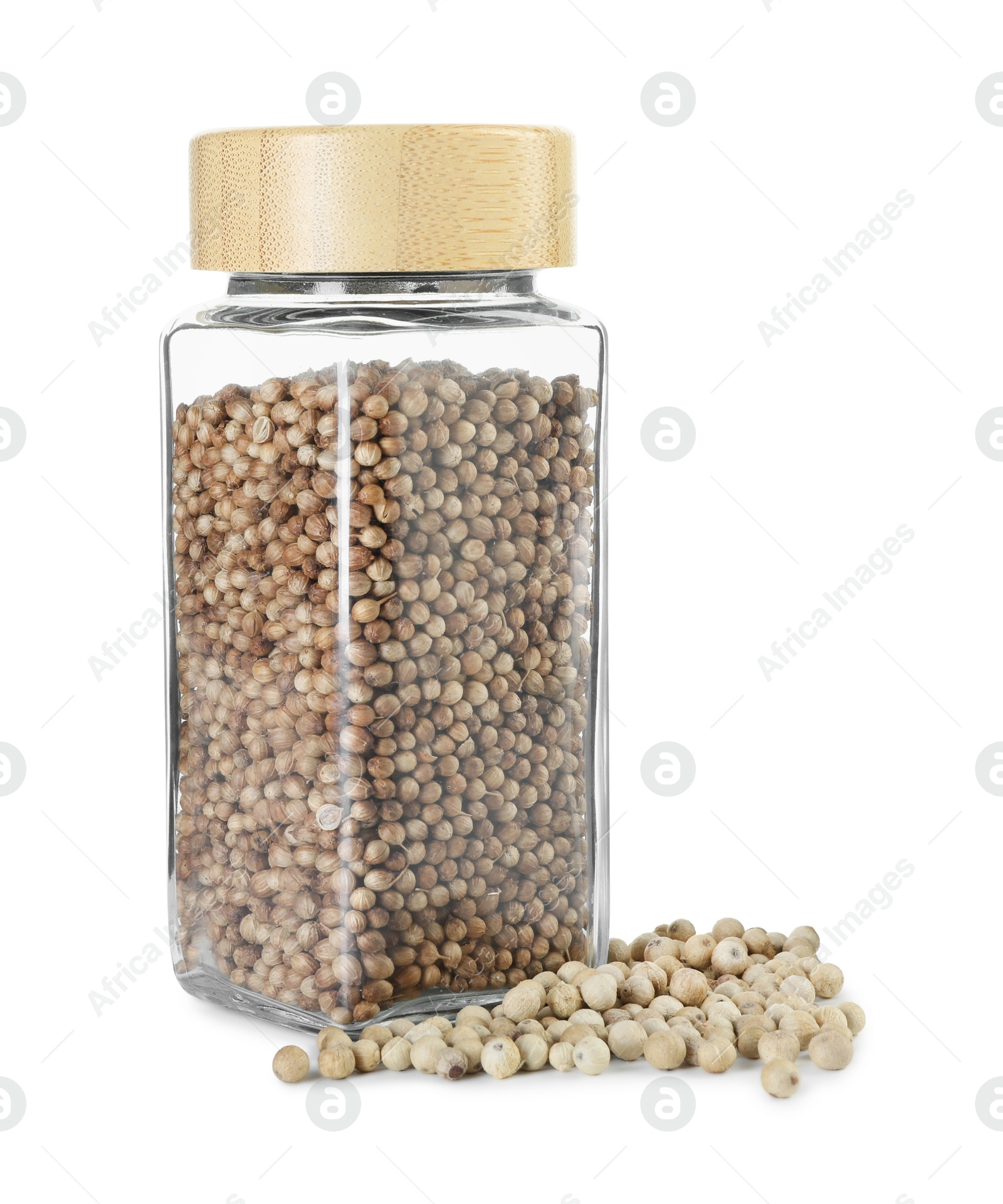 Photo of Coriander in glass jar isolated on white