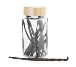 Photo of Vanilla pods in glass jar isolated on white