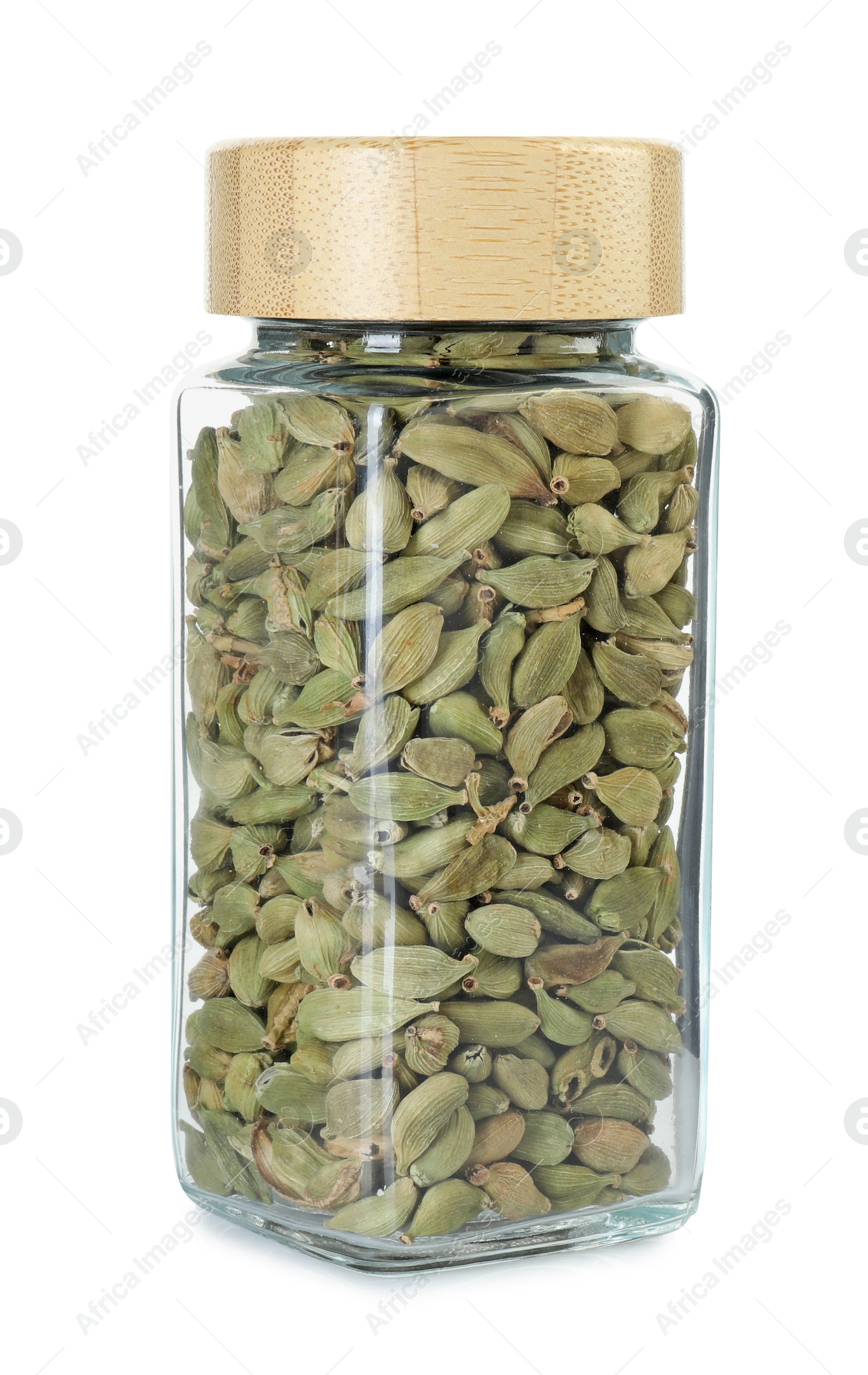 Photo of Cardamom in glass jar isolated on white