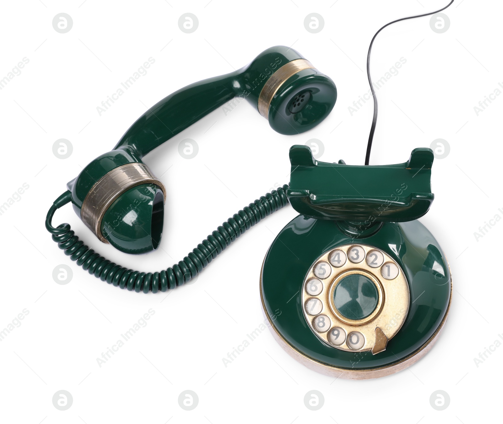 Photo of Green vintage corded telephone isolated on white