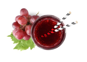 Photo of Tasty grape juice, straws, leaf and berries isolated on white, top view