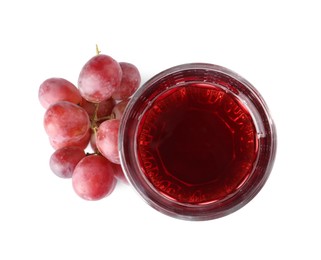 Tasty grape juice in glass and berries isolated on white, top view