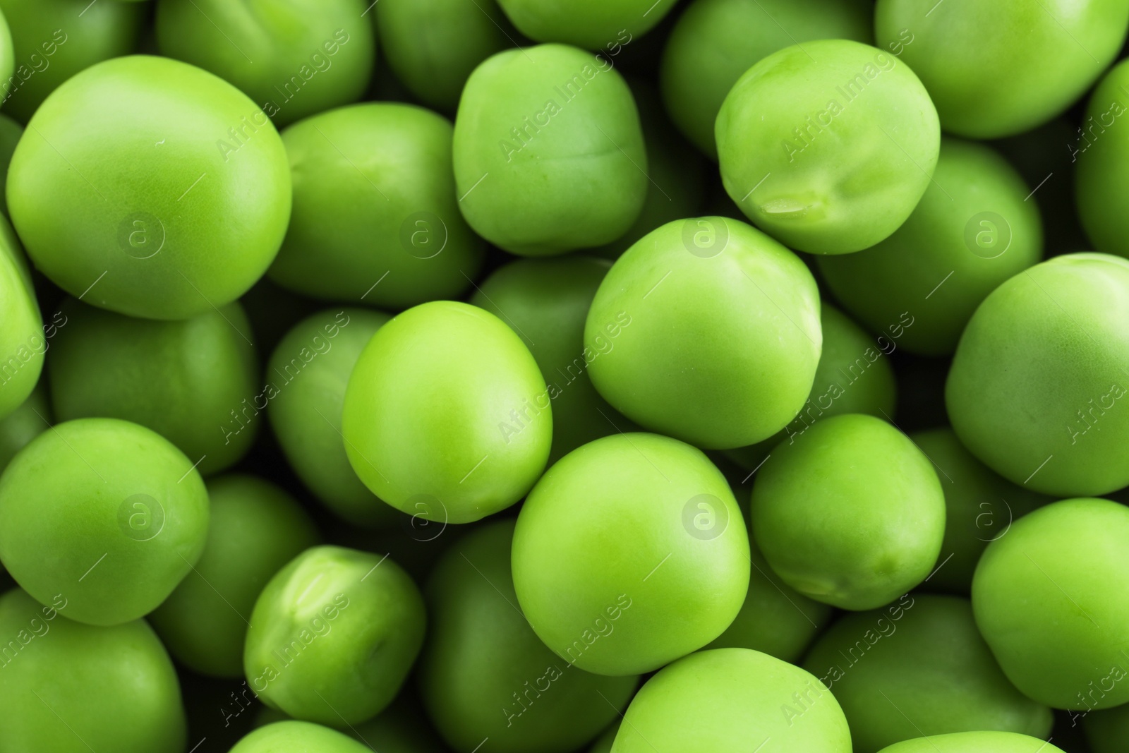 Fresh green peas as background, top view Photo of Fresh green peas as background, top view