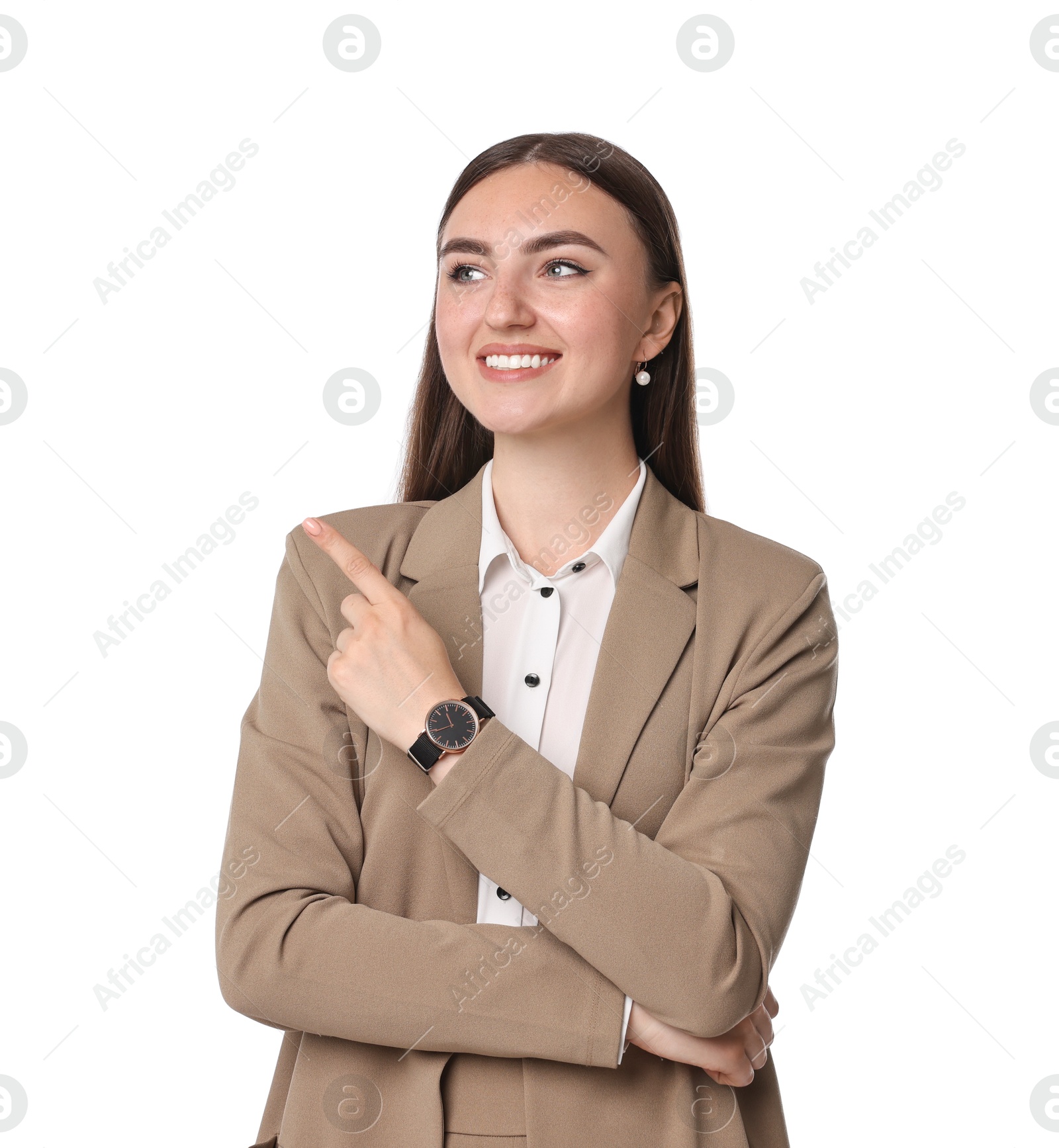 Photo of Beautiful woman in beige suit pointing at something on white background