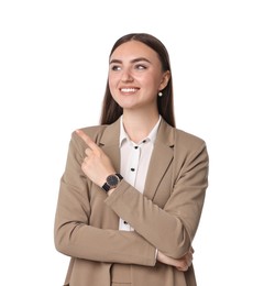 Photo of Beautiful woman in beige suit pointing at something on white background