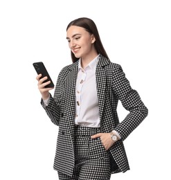 Beautiful woman in stylish suit using smartphone on white background