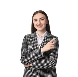 Photo of Beautiful woman in stylish suit pointing at something on white background