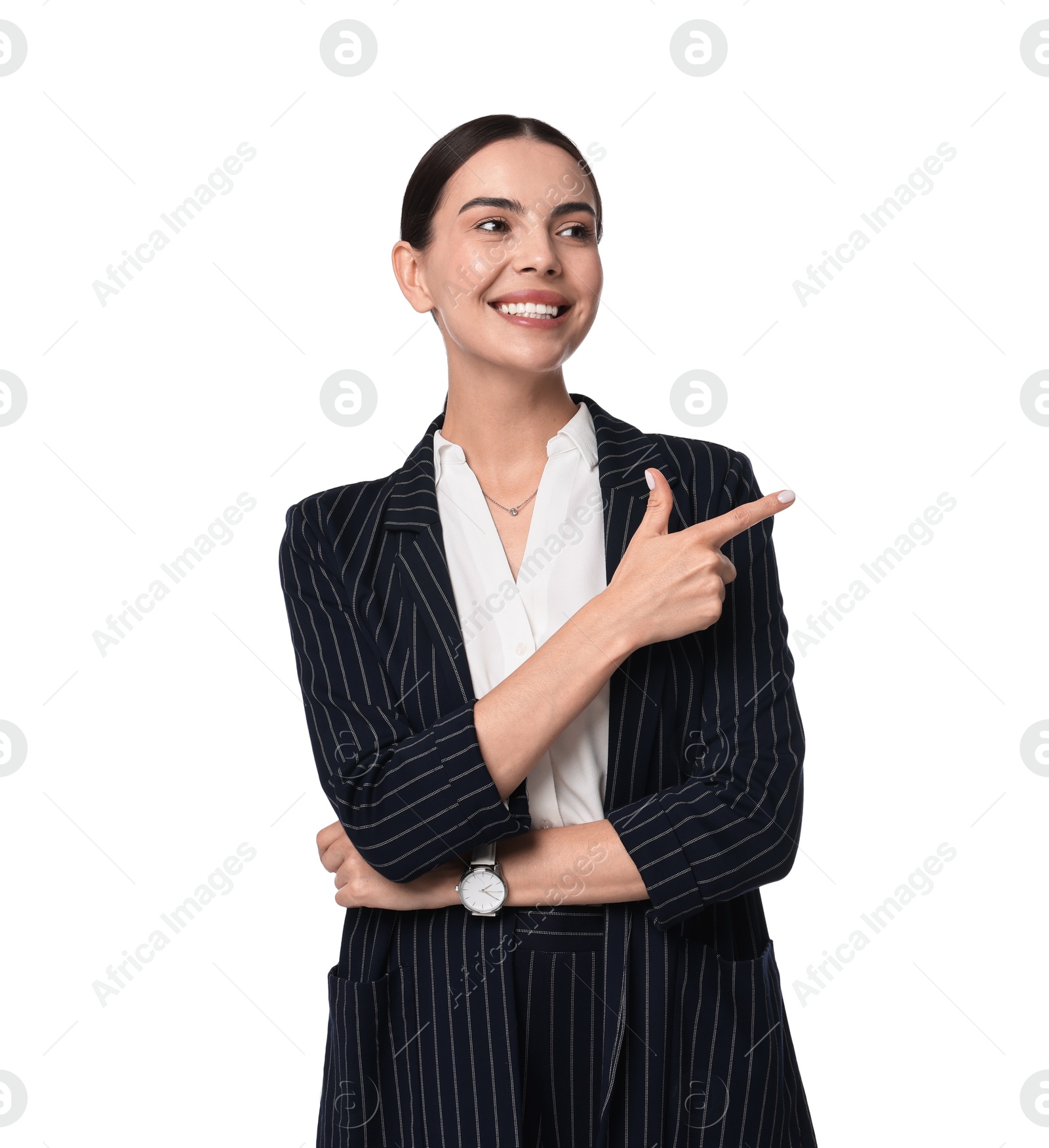 Photo of Beautiful woman in black striped suit pointing at something on white background