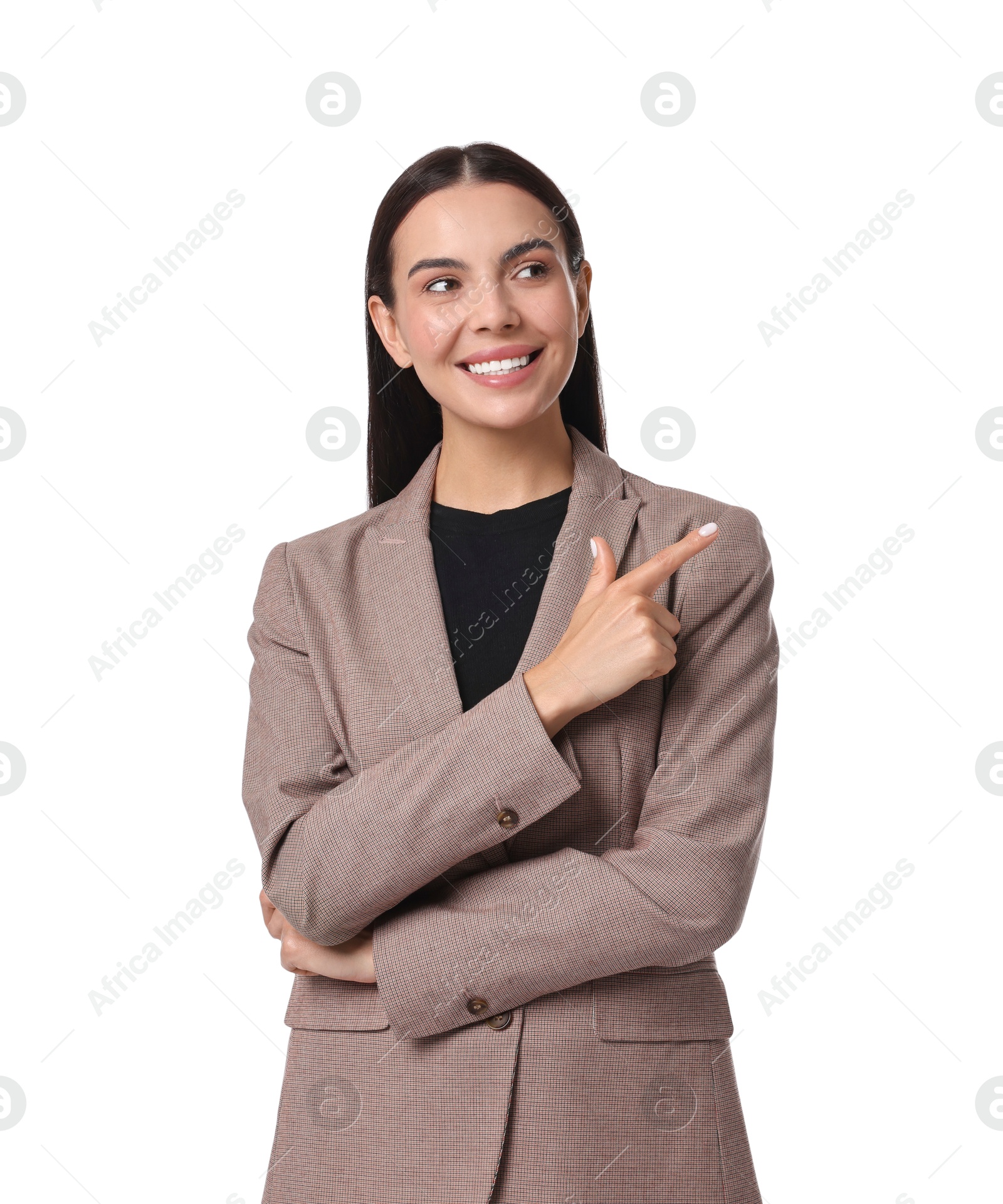 Photo of Beautiful woman in beige suit pointing at something on white background