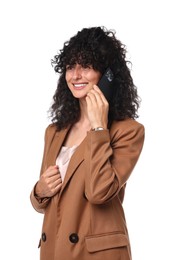 Beautiful young woman in stylish suit talking on smartphone against white background