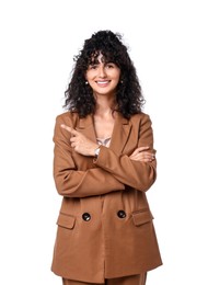 Photo of Beautiful young woman in stylish suit pointing at something on white background