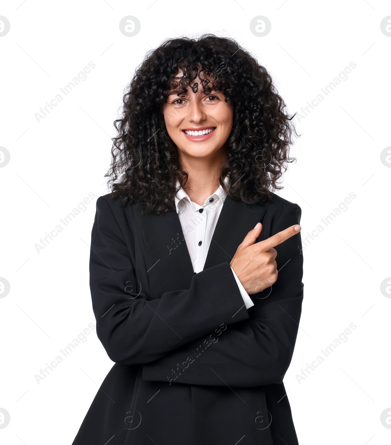 Photo of Beautiful young woman in black suit pointing at something on white background