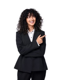 Beautiful young woman in black suit pointing at something on white background