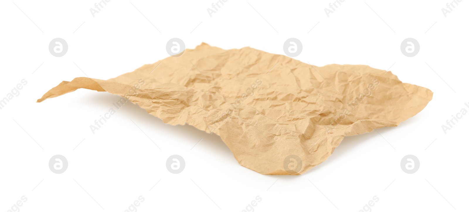 Photo of Crumpled kraft paper sheet isolated on white