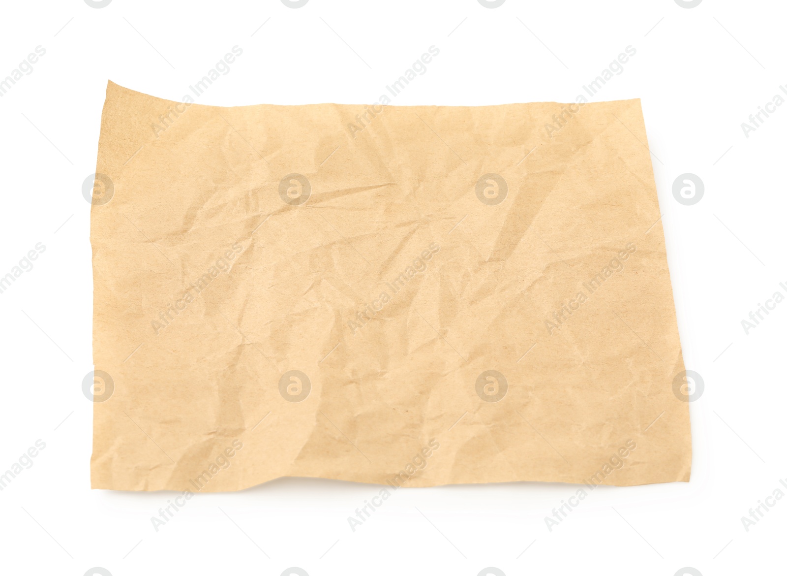 Photo of Crumpled kraft paper sheet isolated on white, top view