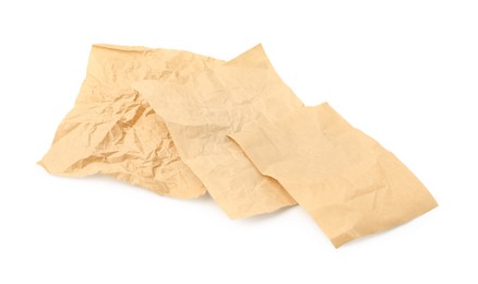 Photo of Crumpled kraft paper sheets isolated on white