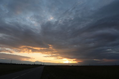 Photo of Beautiful cloudy sky over highway on sunset