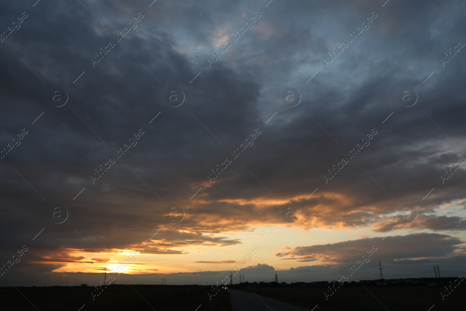 Photo of Beautiful cloudy sky over highway on sunset