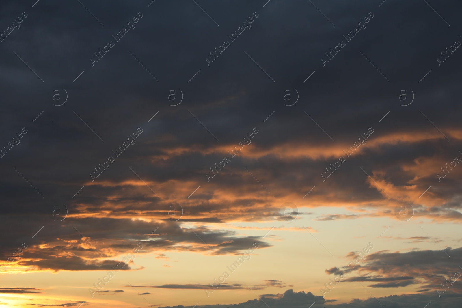 Photo of Picturesque view of sky with clouds on sunset