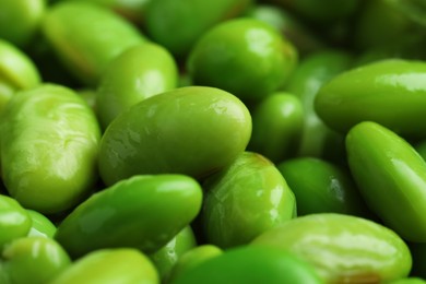 Photo of Fresh edamame soybeans as background, closeup view