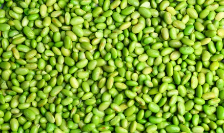 Fresh edamame beans as background, top view