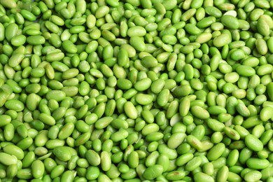 Fresh edamame beans as background, above view