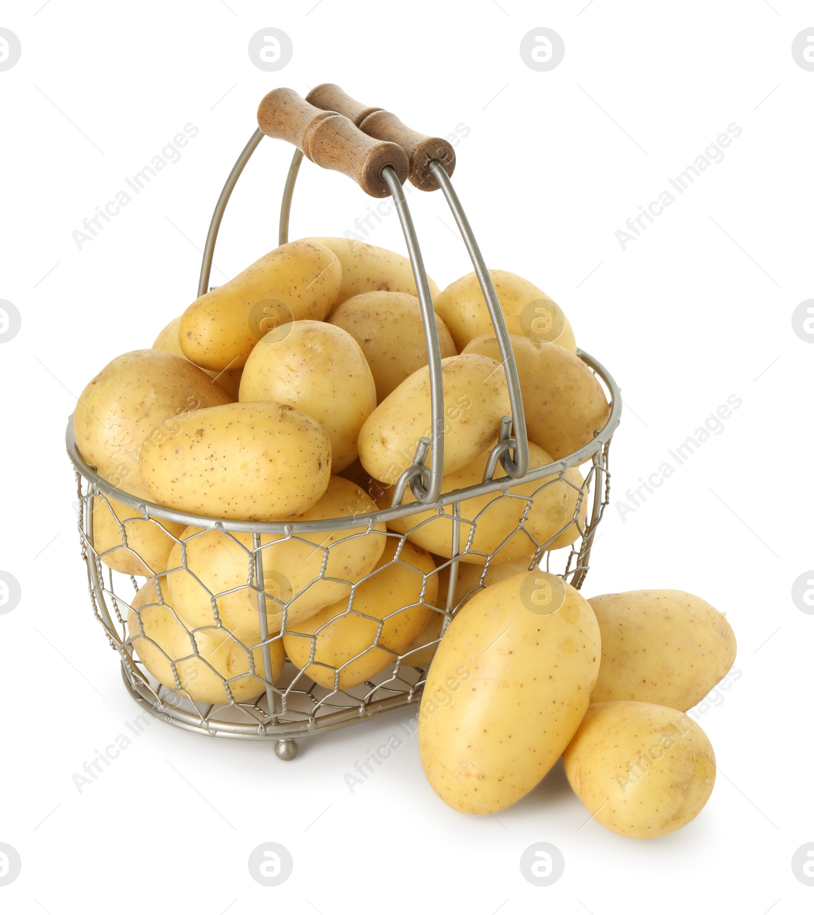 Photo of Young potatoes in metal basket isolated on white