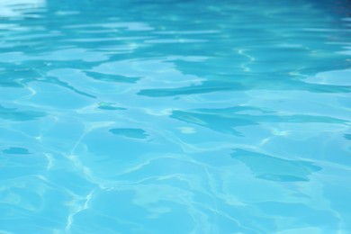 Clear water in outdoor swimming pool on sunny day