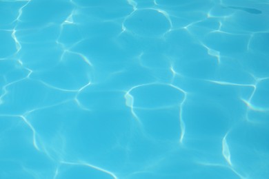 Clear water in outdoor swimming pool on sunny day