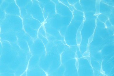 Clear water in outdoor swimming pool on sunny day