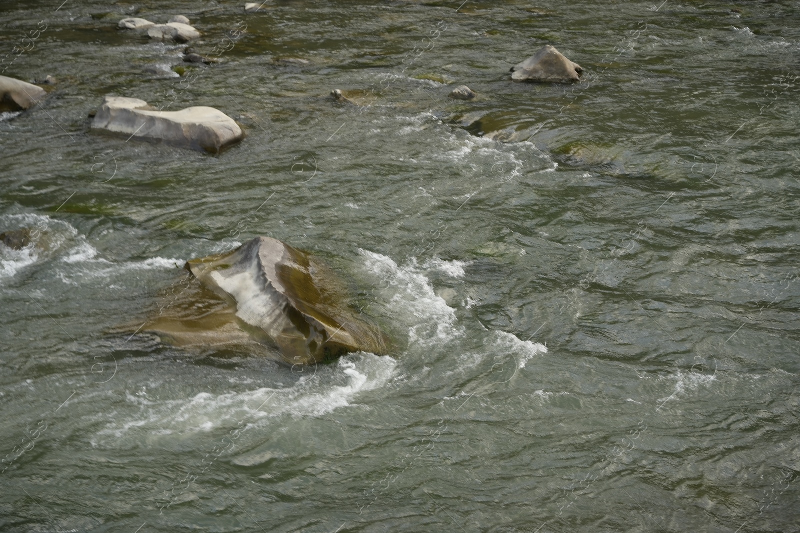 Photo of Beautiful view of mountain river with stones