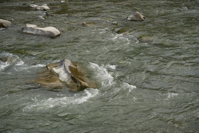 Photo of Beautiful view of mountain river with stones