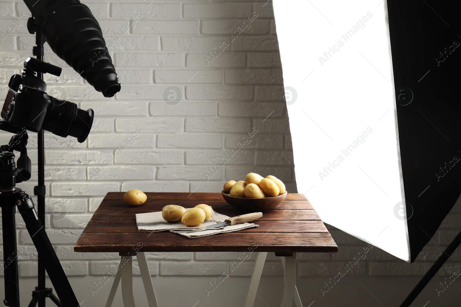 Photo of Shooting food in photo studio with professional lighting equipment